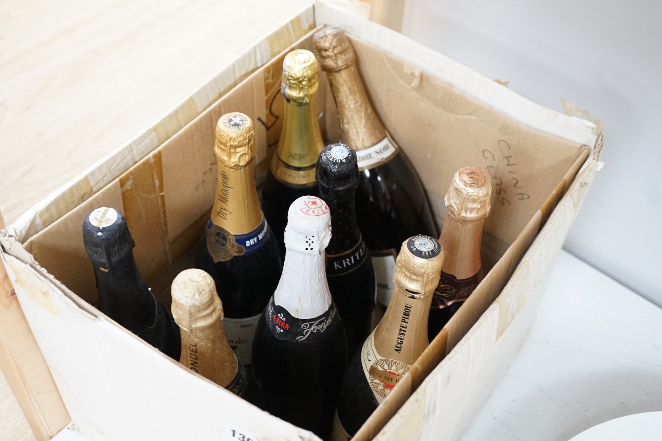 Nine various bottles of champagne, cava and sparkling wine
